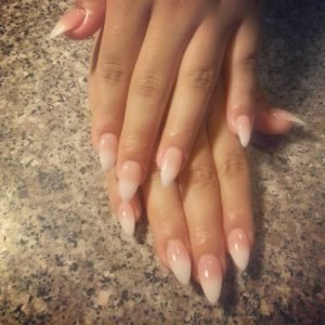 Stilleto shaped ombre nails done by our nail tech Susana